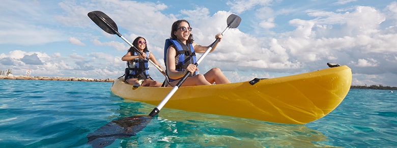 group of guests prepping to go kayaking