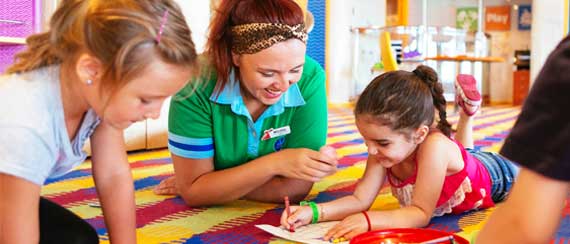  Kids and Teens - children playing games with supervisor on carnival cruise
