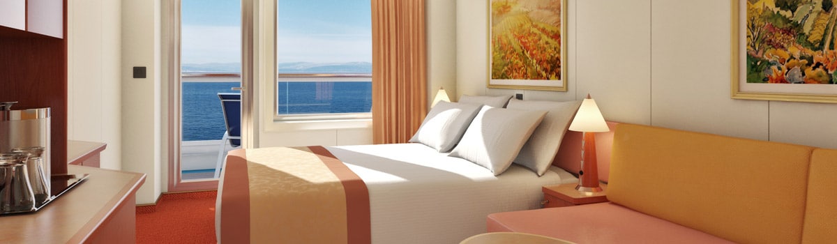 Balcony stateroom aboard Carnival Glory with a private outdoor balcony