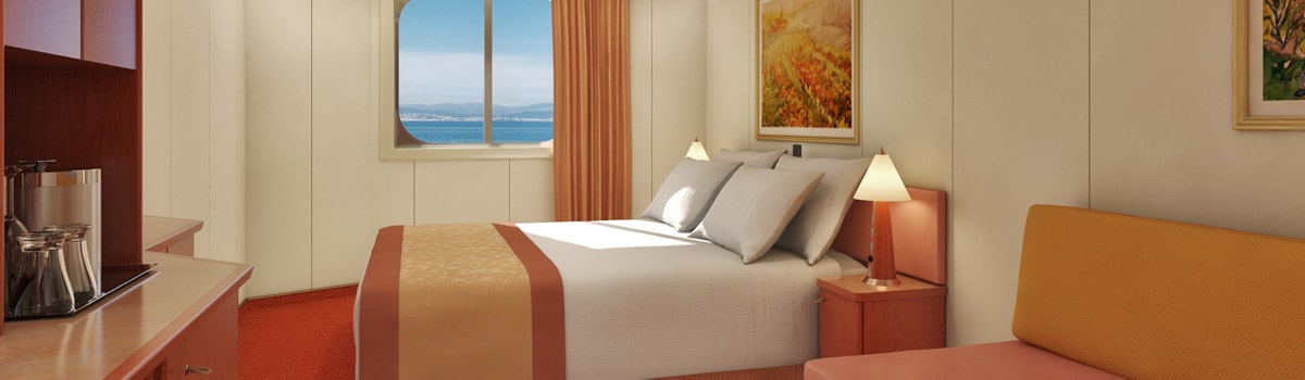 Ocean view stateroom aboard Carnival Glory with a picture window