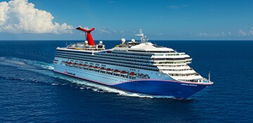 carnival radiance sailing out into the blue caribbean sea