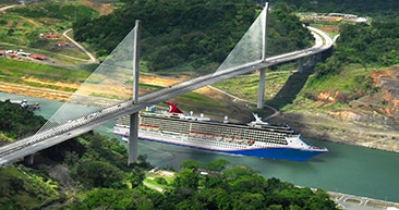 aerial view of carnival ship passing through panama canal