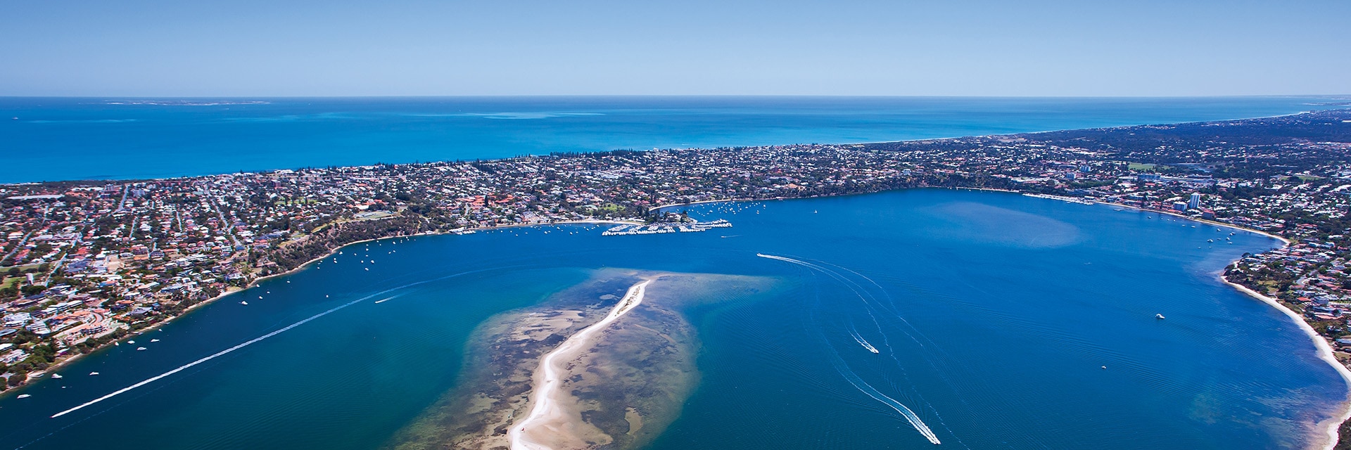the ocean brushes up on a coast in fremantle