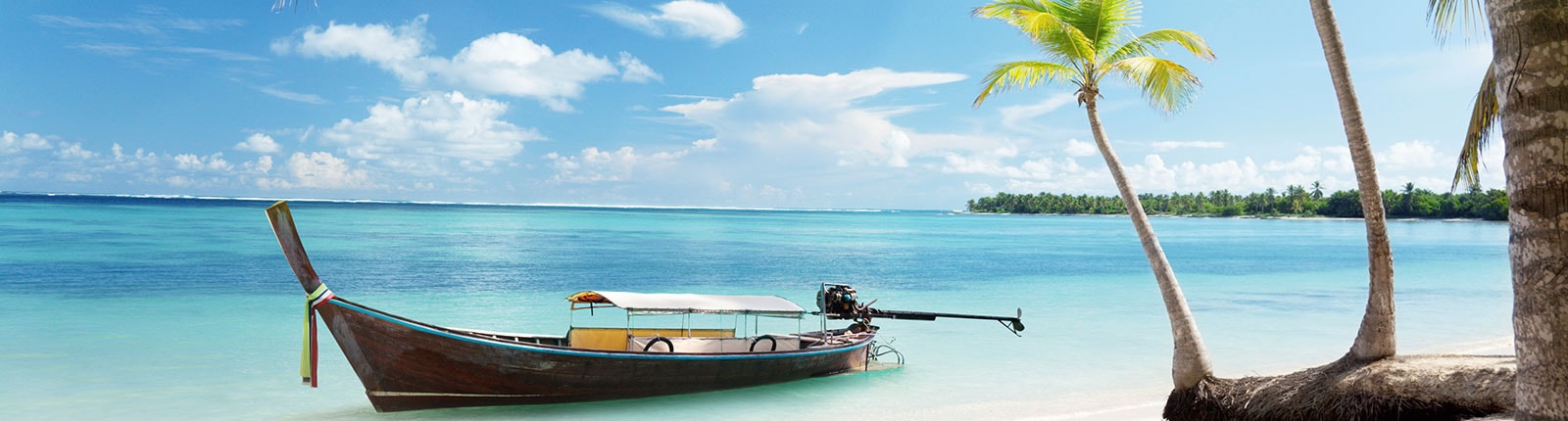 A speedboat anchored on the shore in La Romana, Dominican Republic