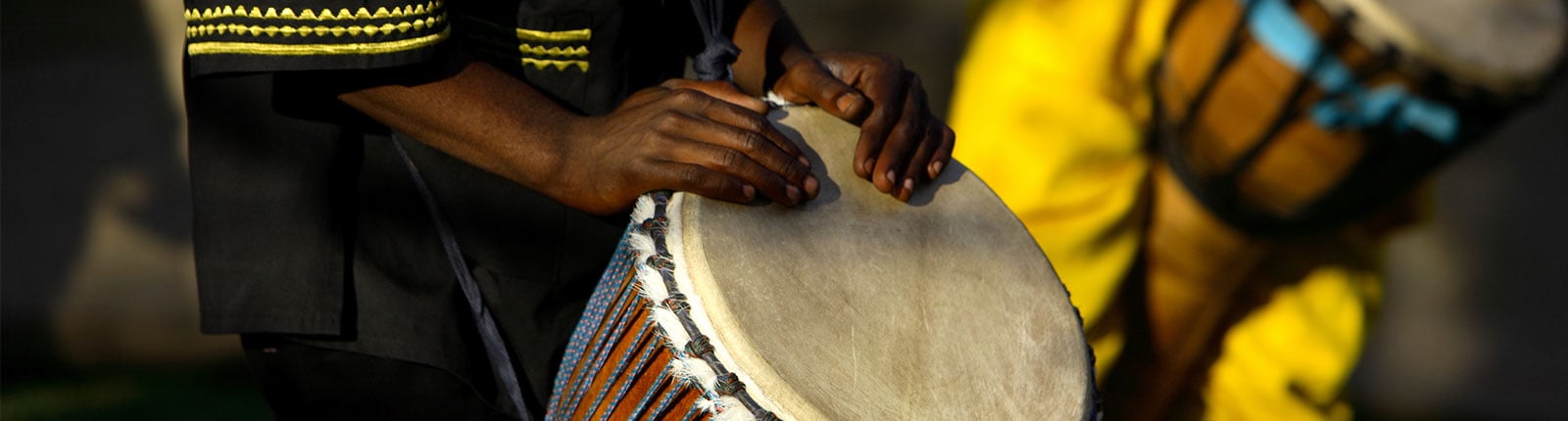 Local musician beating drum in Martinique