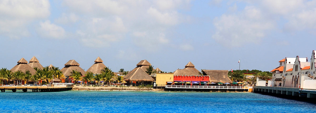 view of shops by the cozumel pier