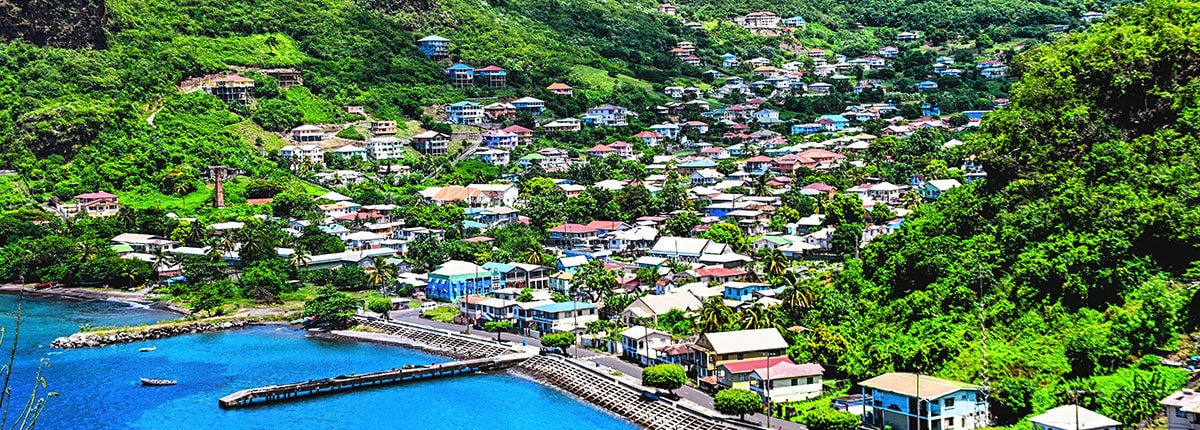 view of a natural poole coral reefs with sail boats