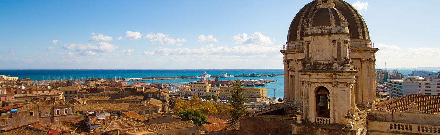 cathedral cupola and the catania town in catania, sicily