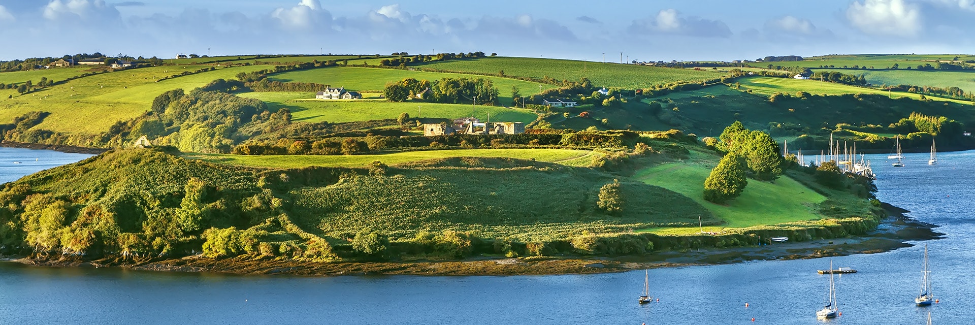 view of green hill with water from Charles Fort, Ireland