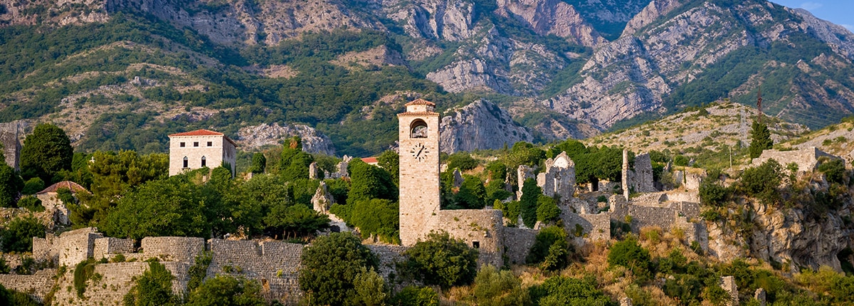 view of ancient city in the mountains in Bar, Montenegro