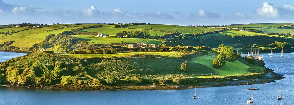 view of green hill with water from Charles Fort, Ireland