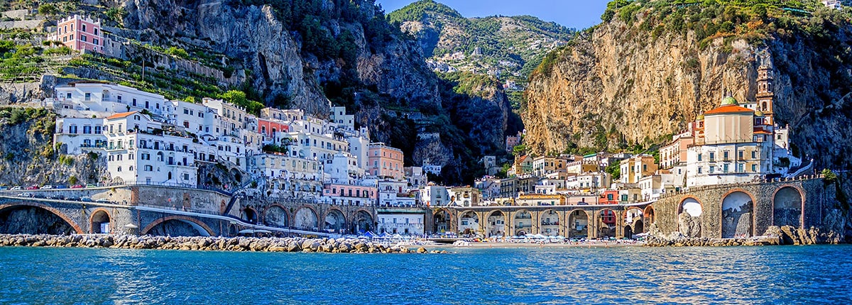 view of the salerno coast with lush mountains and blue waters