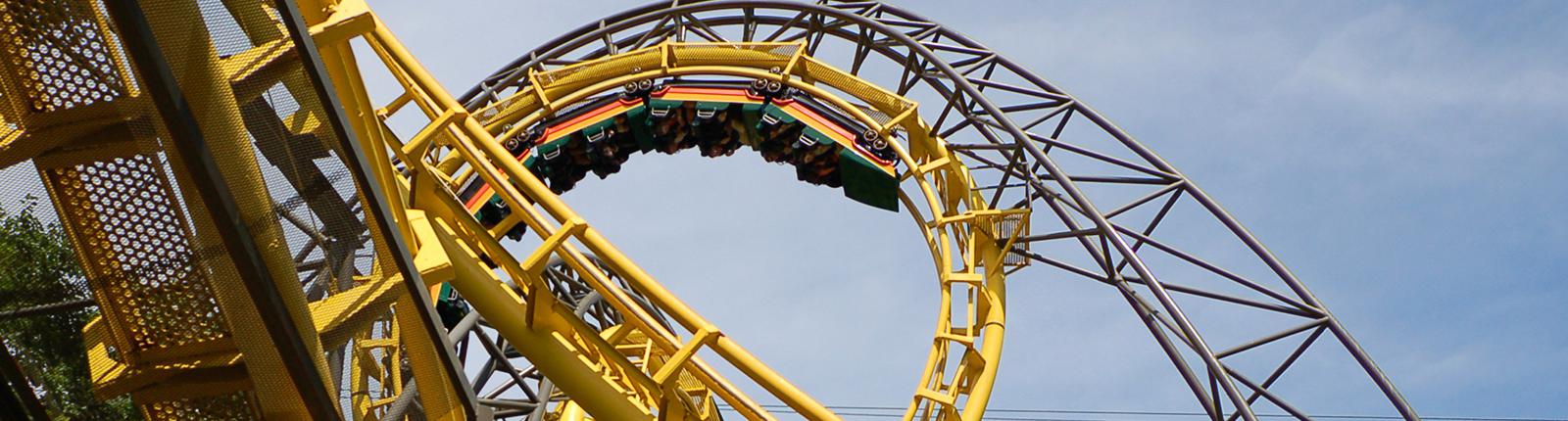A roller coaster taking tourists for a wild ride in Busch Gardens located in Tampa, FL