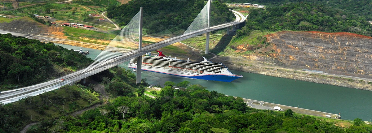 aerial view of a carnival cruise ship navigating the panama canal