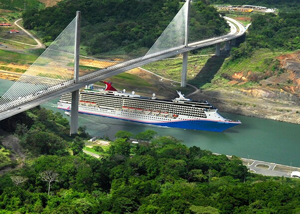 aerial view of a carnival cruise ship navigating the panama canal