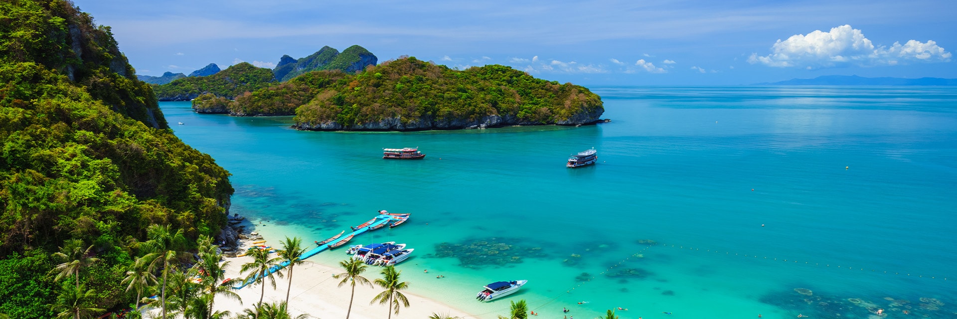 small lush green islands are located off the coast of koh samui