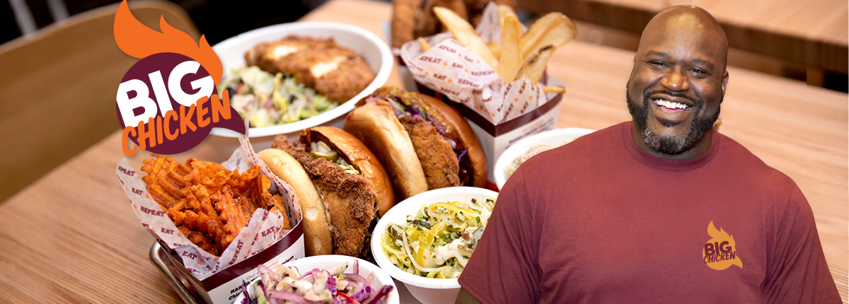 shaq’s big chicken restaurant filled with over-sized chicken sandwiches, fries and side dishes
