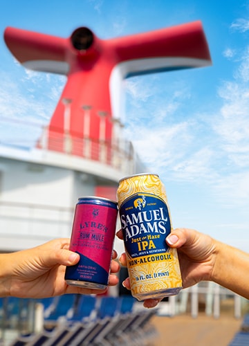 variety of non-alcoholic canned beverages and sodas on a carnival cruise