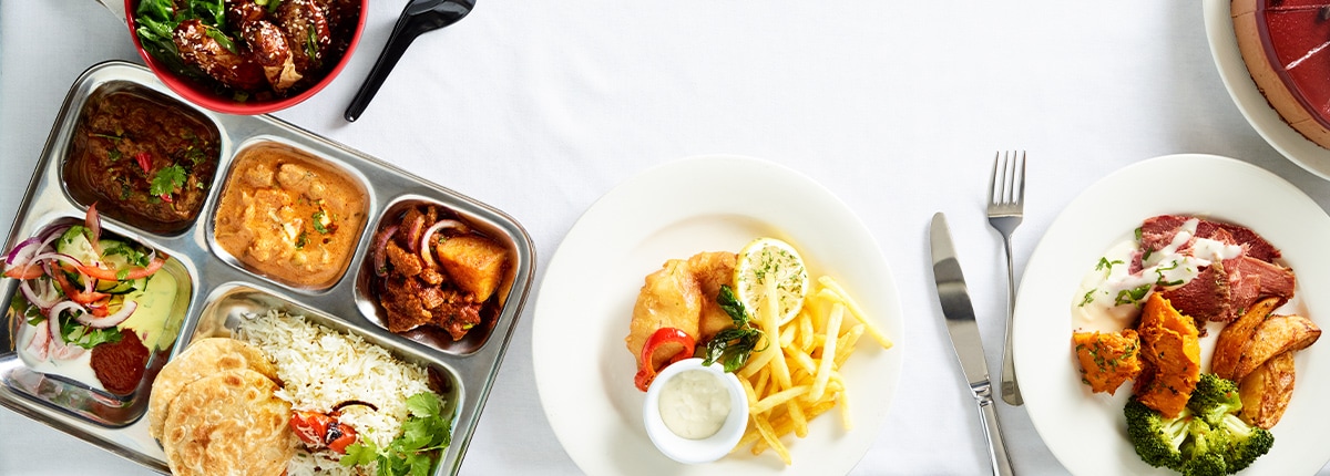 several delicious dishes placed on a table