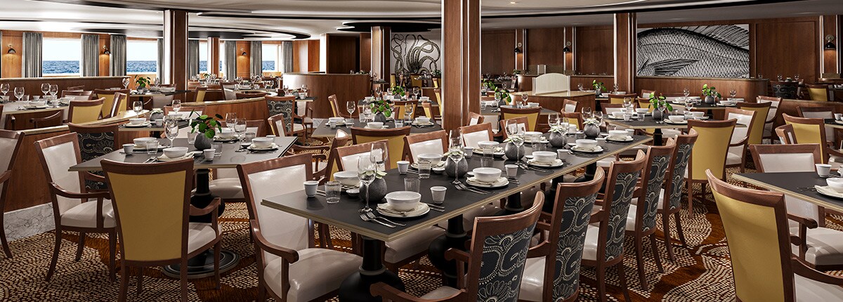 view of the dining tables and chairs in the waterfront restaurant