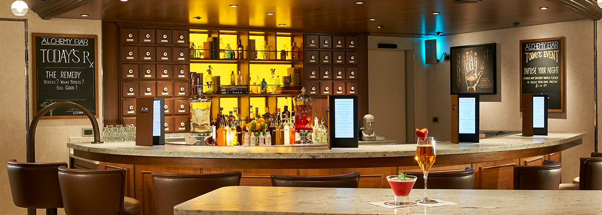grab a cocktail at the alchemy bar on carnival