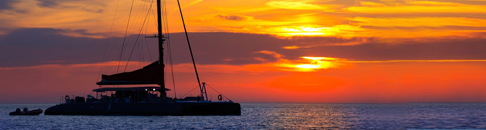 Sailboat on the coast of Nassau, Bahamas during sunset 