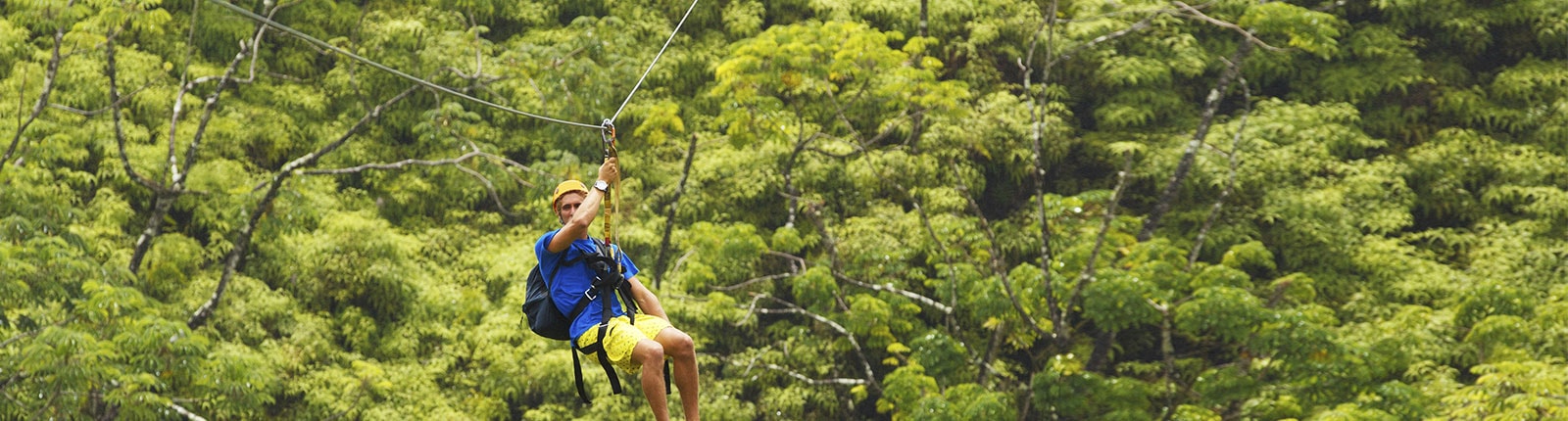 Ziplining through the forest canopy in Amber Cove, Puerto Plata, Dominican Republic