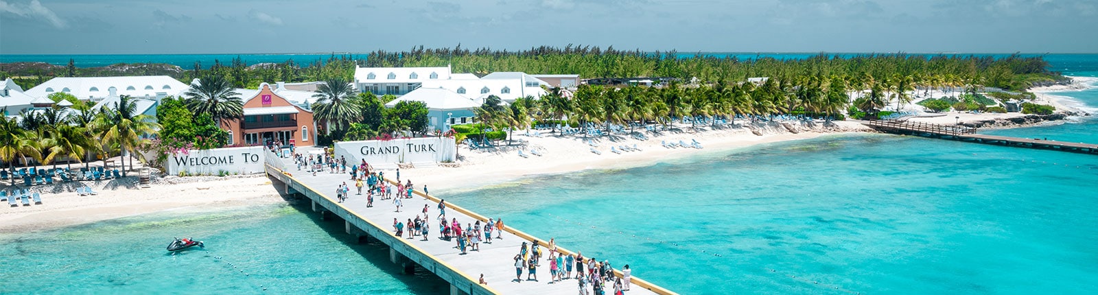 People enjoying the day on a pier in Grand Turk