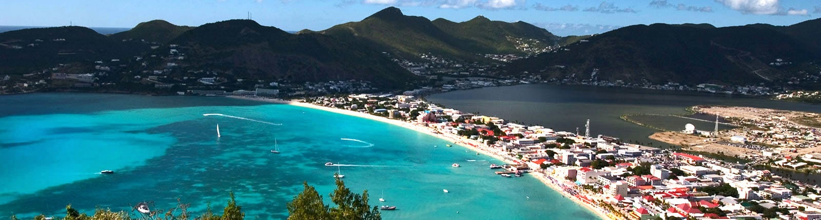Aerial view of St. Maarten coastal town and mountains