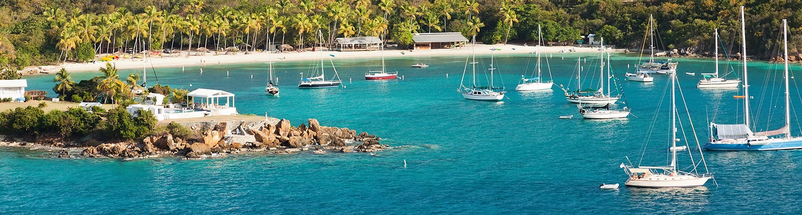 Sailboats anchored in a cove of St. Thomas, US Virgin Islands
