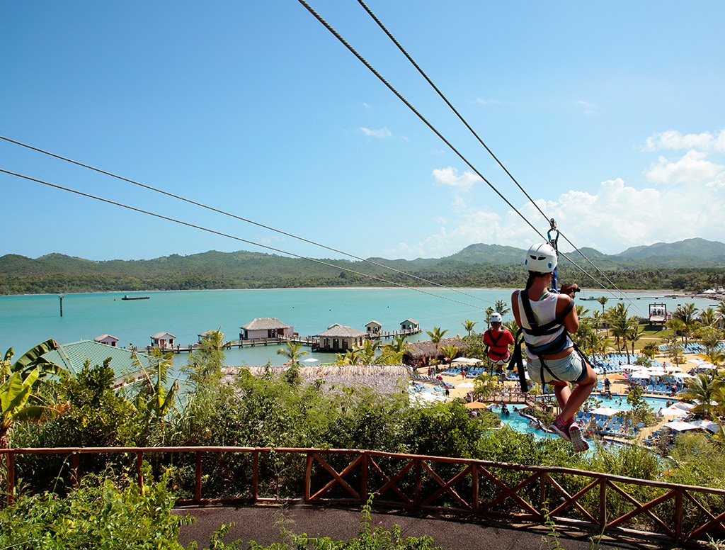 two people zip lining in amber cove