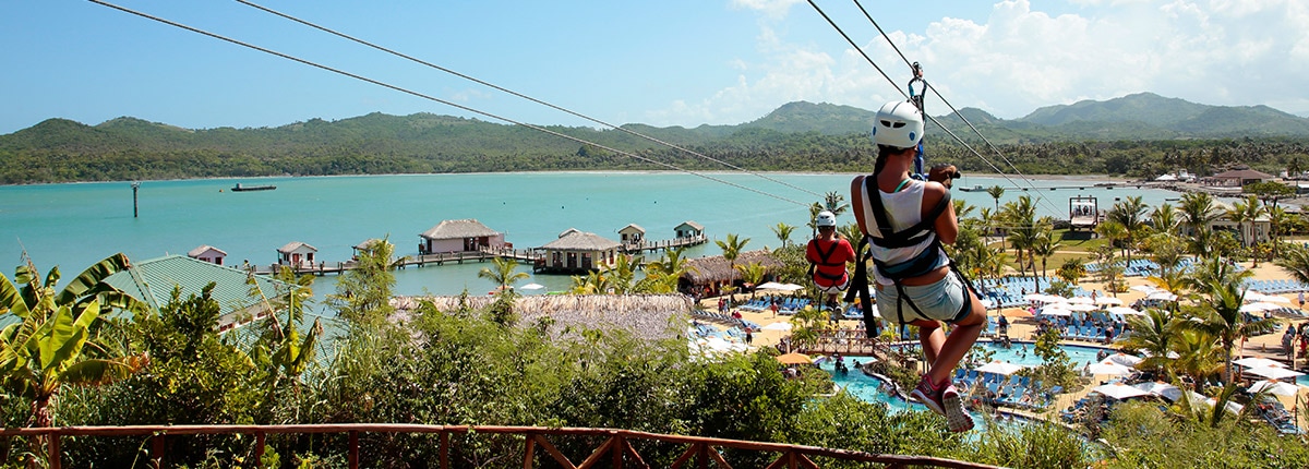 two people zip lining in amber cove