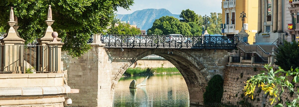 segura river and old bridge in cartagena, spain