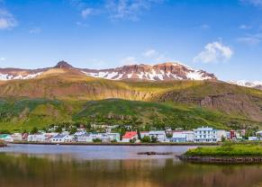 panoramic view of seydisfjordur, iceland with mountains in the background