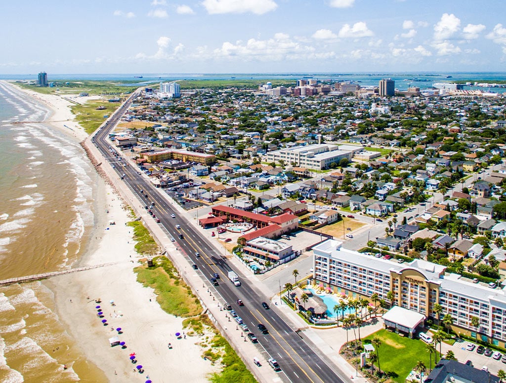 aerial view of  the city of galveston and the beautiful beach