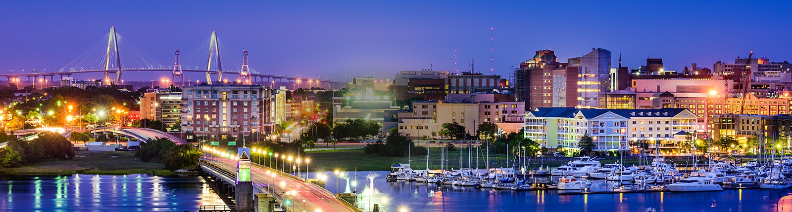 Charleston waterfront illuminated at dusk