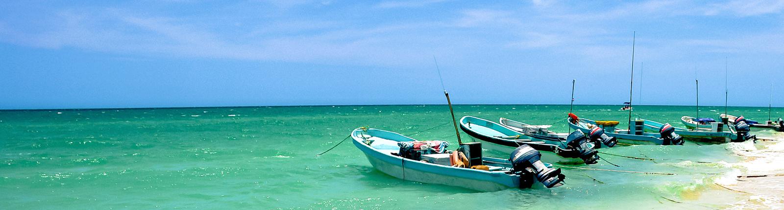 View of boats in the beautiful blue waters of Progreso, Yucatan