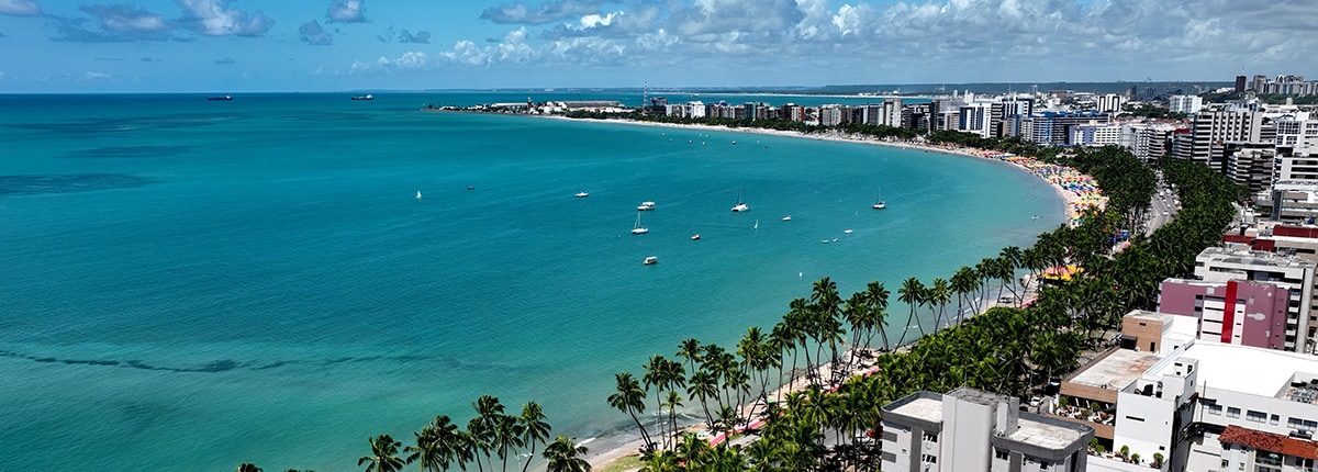 view of a natural poole coral reefs with sail boats