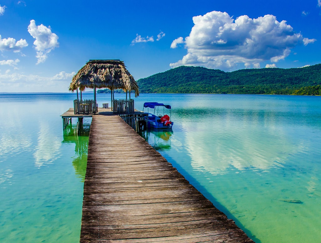 views of the ocean and mountains from dock in belize