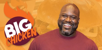 shaq’s big chicken restaurant with an oversized sandwich