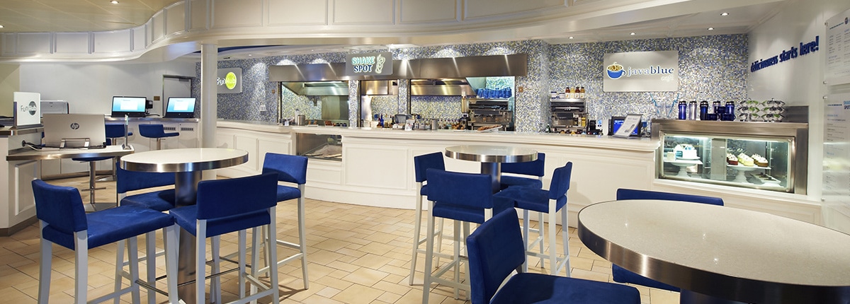 blue chairs are located in the dining area at the javablue cafe