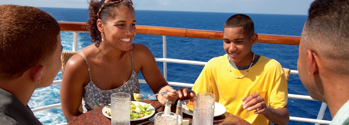 family enjoying food at lido on carnival cruise ship