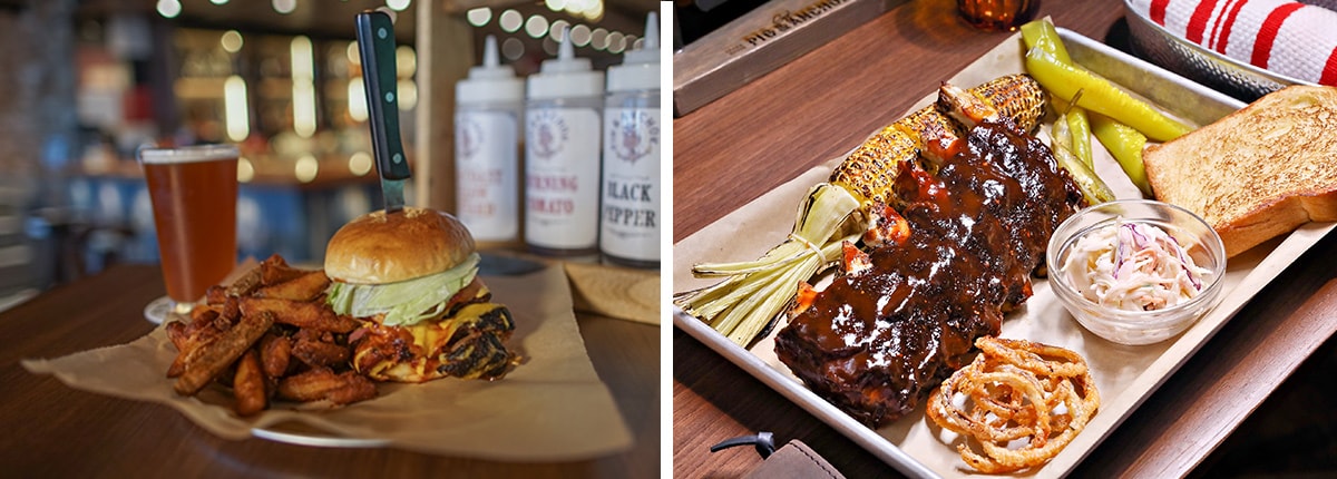 bbq ribs are served with pickles and a burger is served with fries at guys smokehouse brewhouse