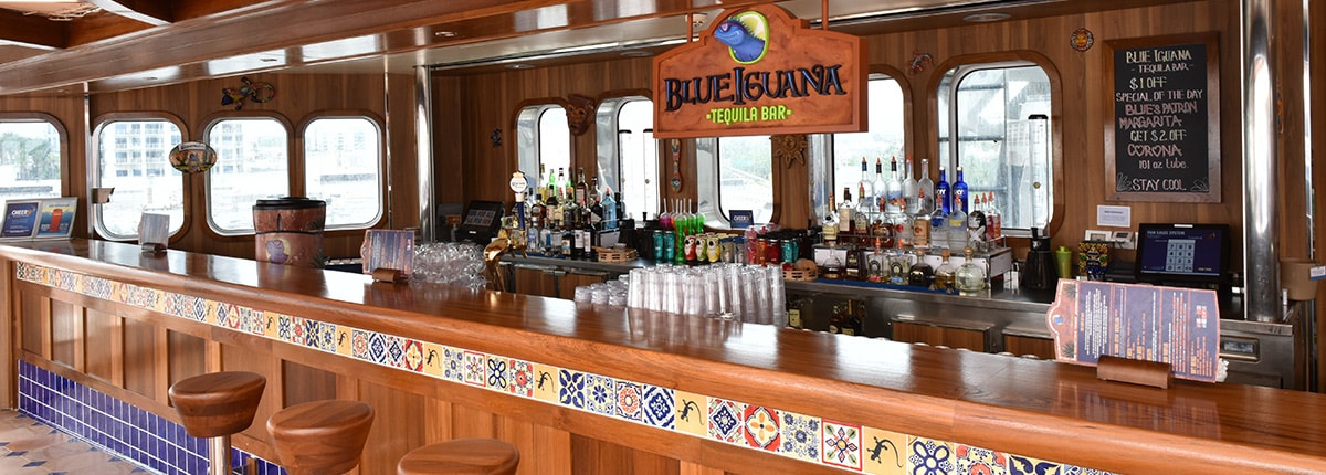 view of the blue iguana tequila bar onboard a carnival cruise