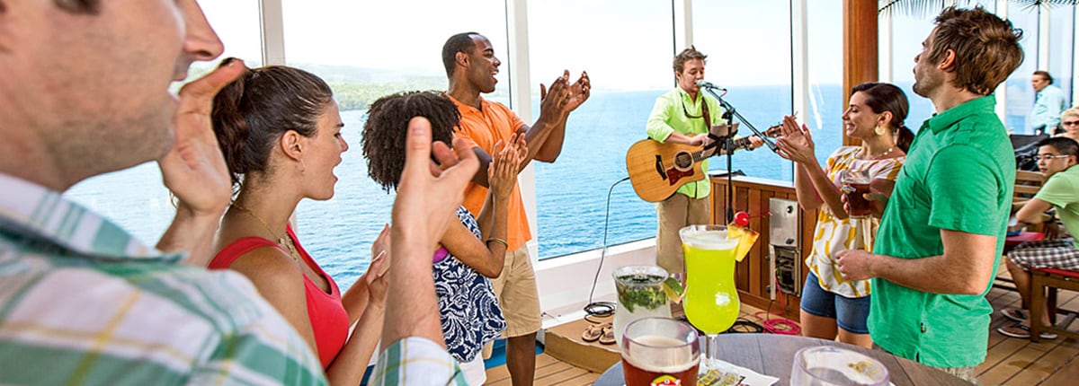 guests enjoying live music on carnival cruise ships