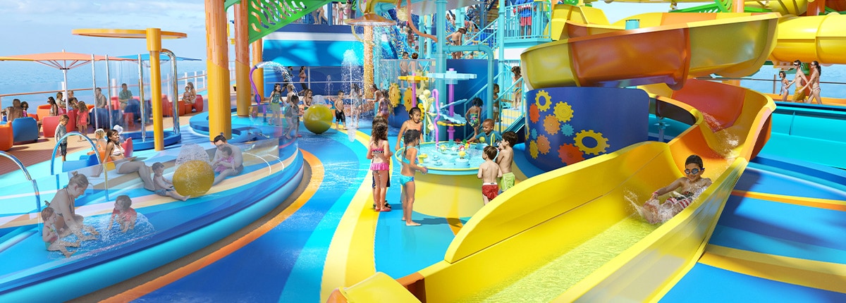 kids play in the splash pad and on waterslides onboard carnival festivale