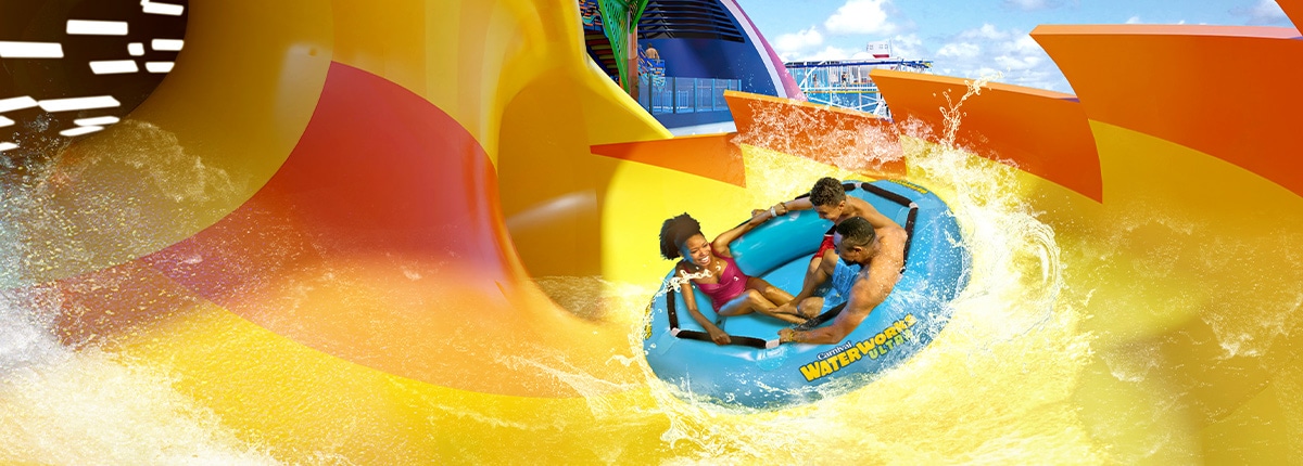 a family of three slides down a waterlisde in a large blue floating raft onboard carnival festivale