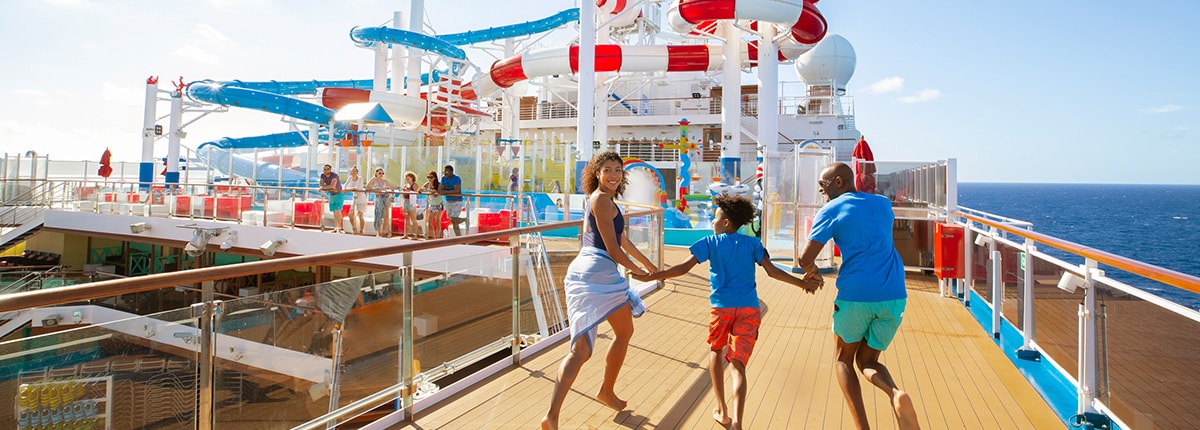 guests running towards the wateworks slide onboard a carnival cruise ship