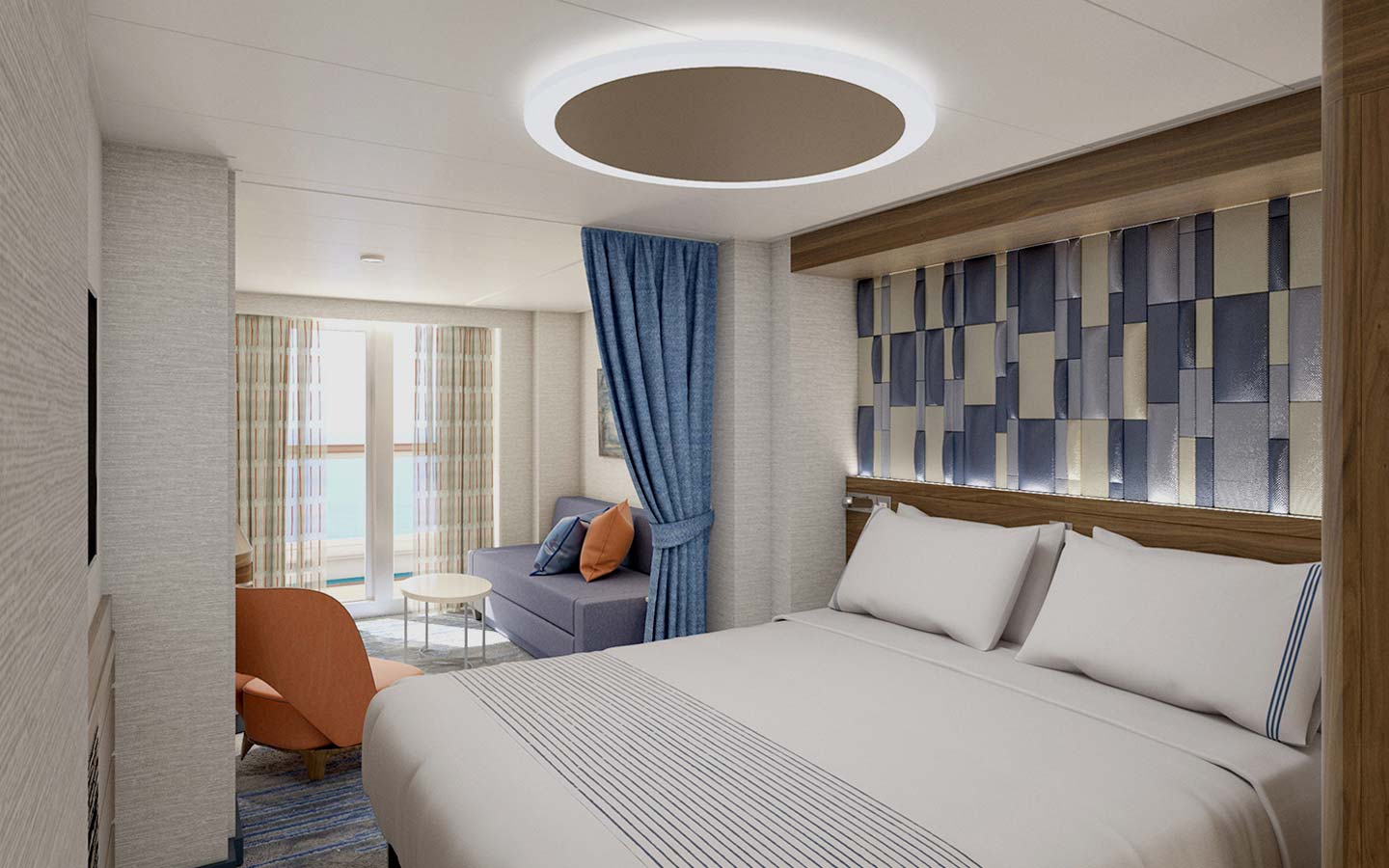 a stateroom with modern designs and a cool color scheme