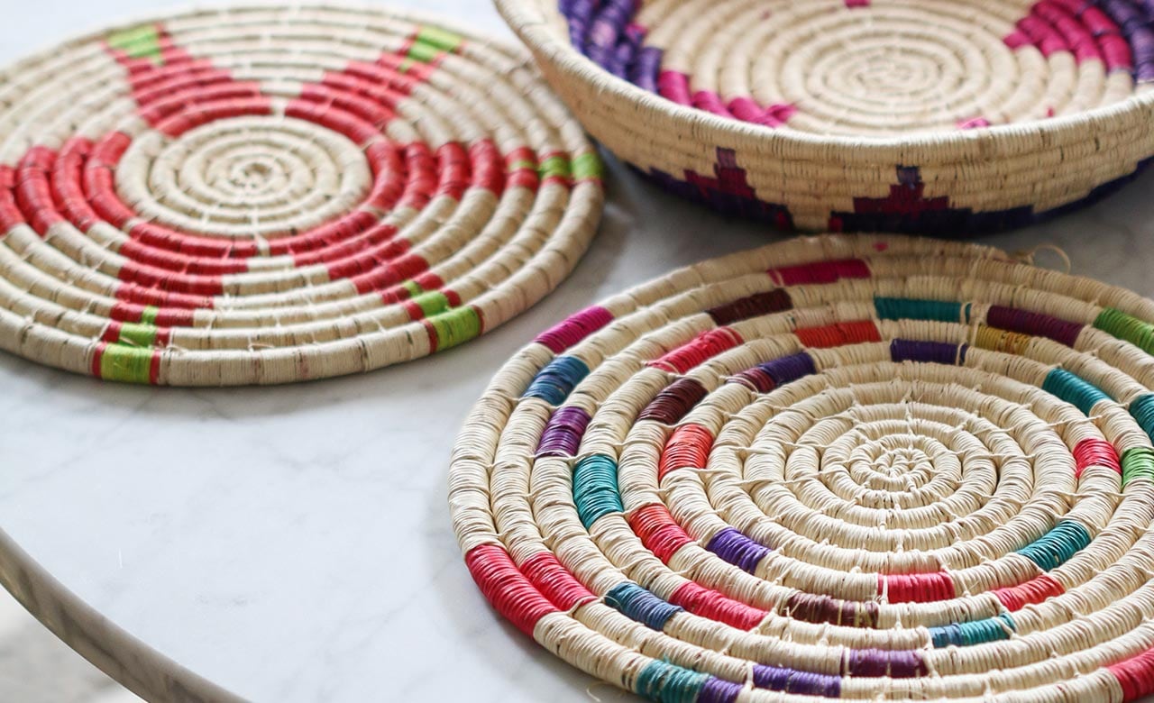 Three colorful pattern-woven placemats